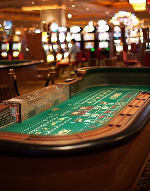 musitoto live studio multi-camera setup for card games, showing roulette and Bandar Ceme adjacent tables